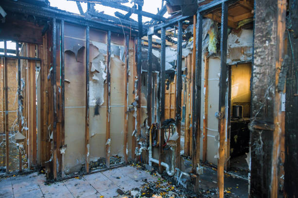 Professional Fire Damage Restoration technician working in Camp Hill, AL